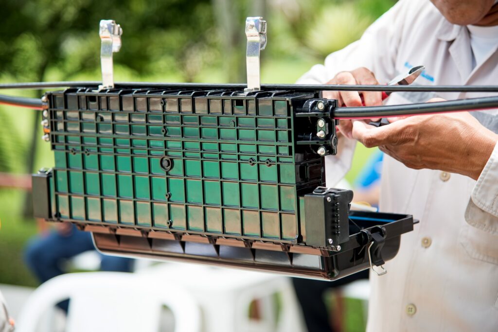 Technicians are installing optic fiber.